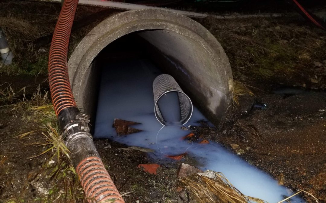 Pigment release into a retention pond