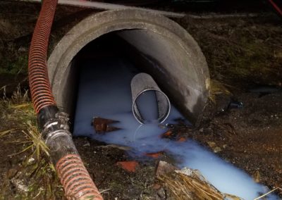 Pigment release into a retention pond